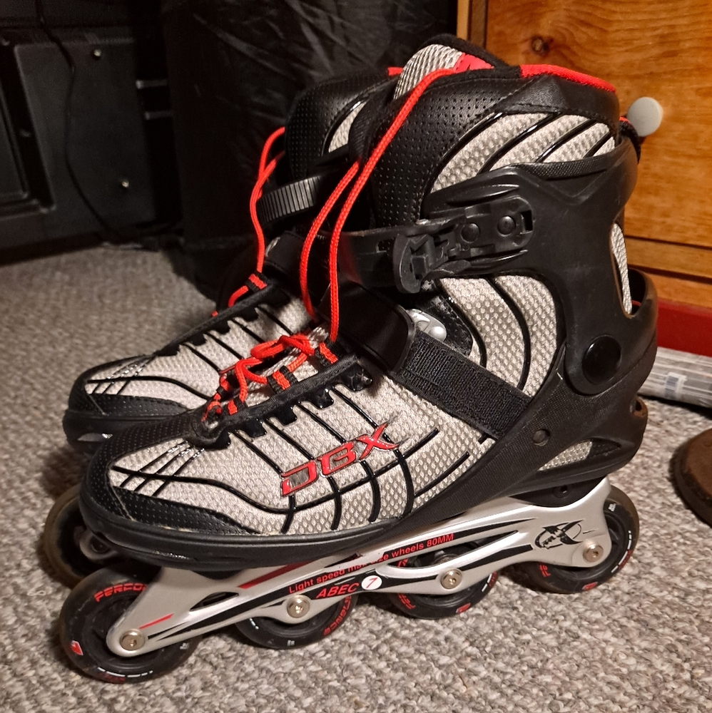 Pair of mens DBX rollerblades New without tags